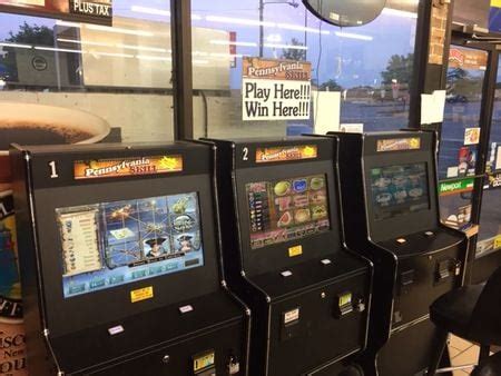 A video slot machine, at right, sits next to an ATM machine and a Lotto pull tab machine at the. . Convenient stores with slot machines near georgia
